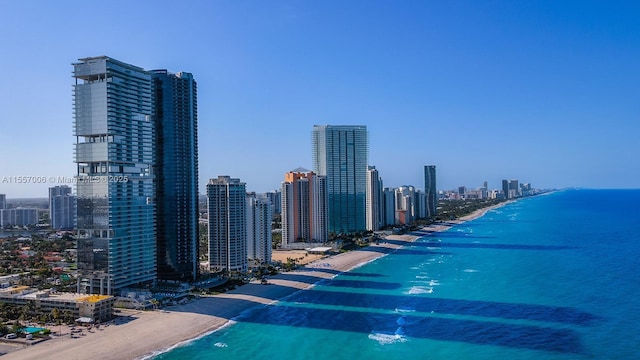 city view with a water view and a view of the beach