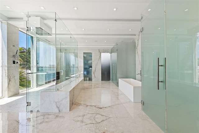 bathroom featuring a shower with shower door