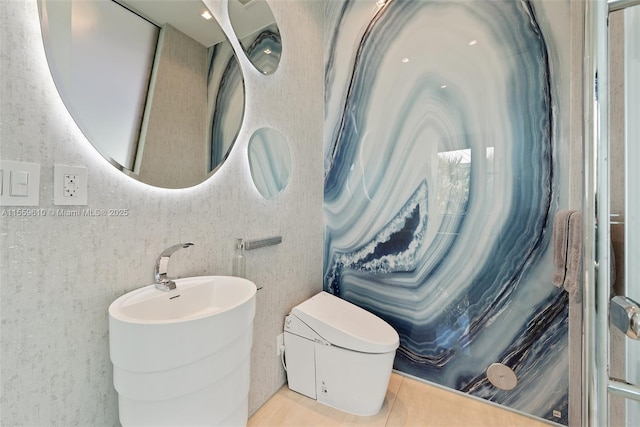 bathroom with tile patterned floors and toilet