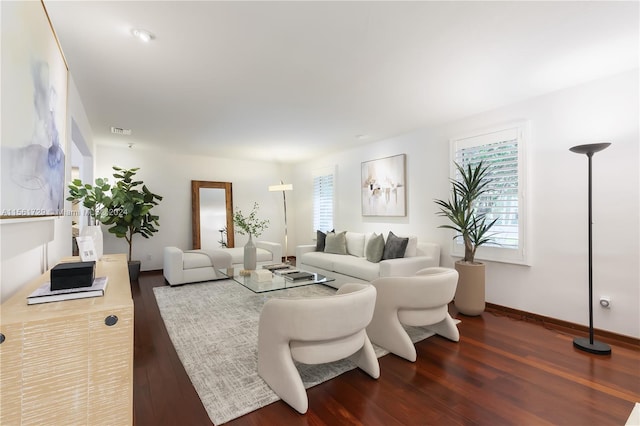 living room with dark hardwood / wood-style floors