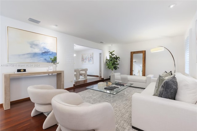 living room with dark wood-type flooring