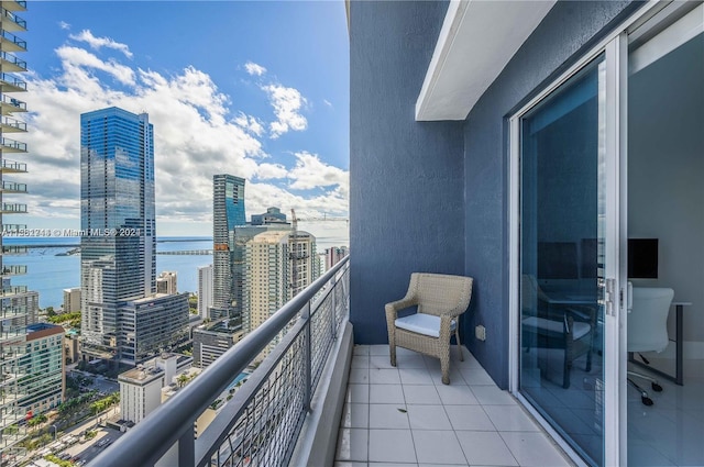 balcony featuring a water view