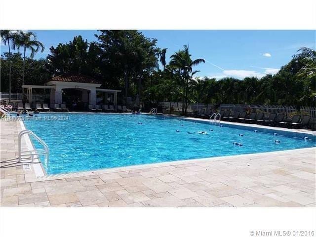 view of swimming pool featuring a patio