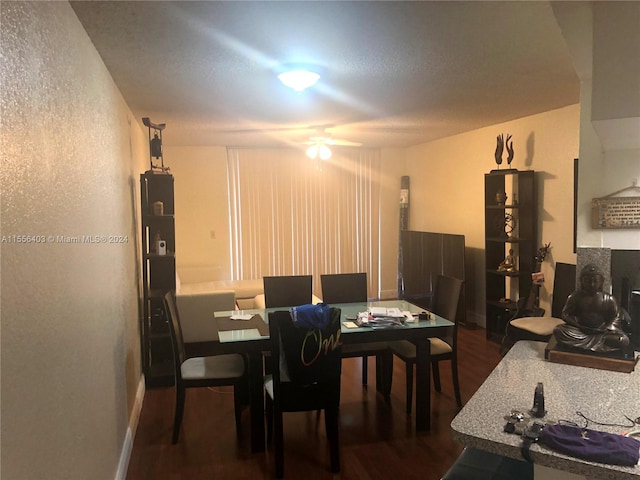 dining space with dark wood-type flooring