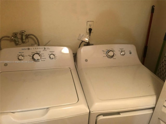 laundry area featuring washer hookup and washer and clothes dryer