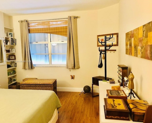 bedroom featuring wood-type flooring