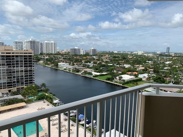 balcony featuring a water view