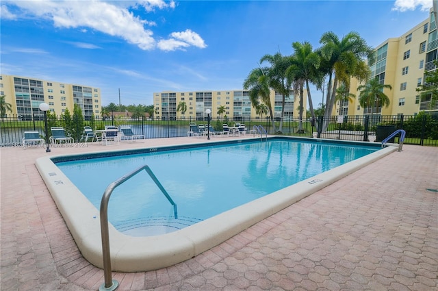 view of swimming pool featuring a patio