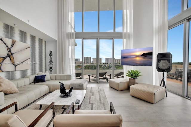 tiled living room featuring a towering ceiling