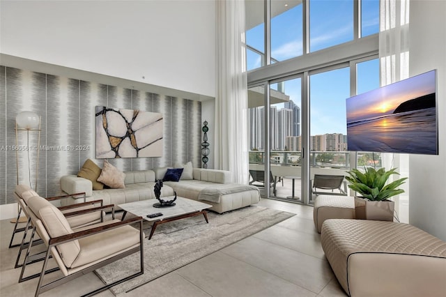 tiled living room with a towering ceiling