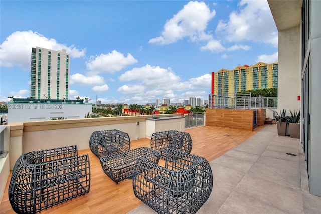 view of patio / terrace with a balcony