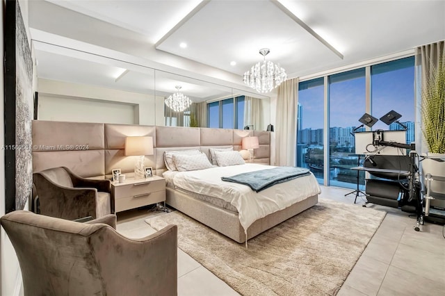 bedroom featuring light tile floors, access to outside, and a chandelier