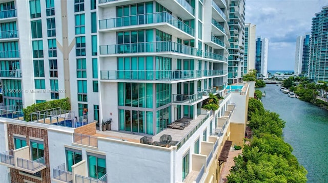 view of property with a water view