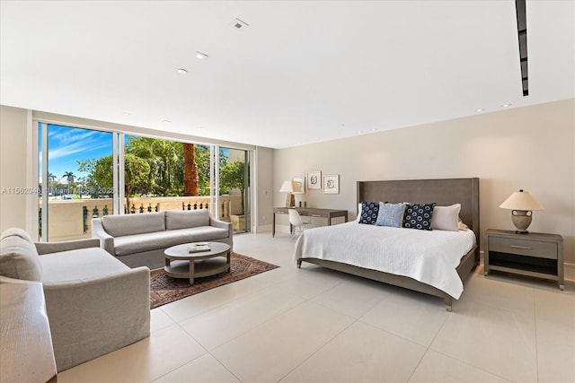 tiled bedroom with expansive windows