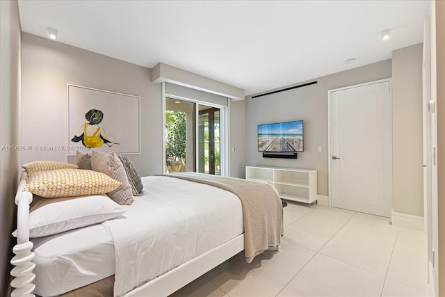 bedroom featuring light tile patterned floors