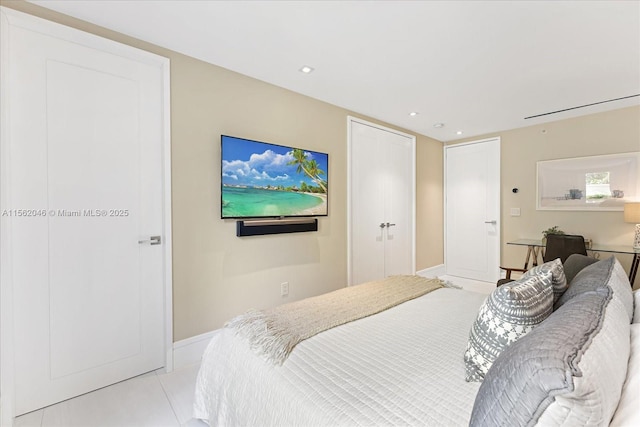 bedroom featuring light tile patterned floors