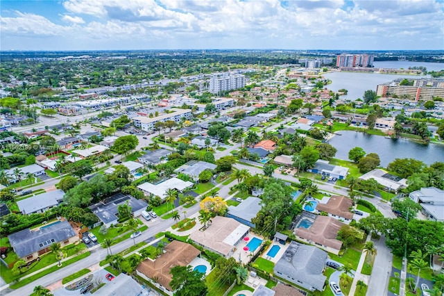 drone / aerial view with a water view