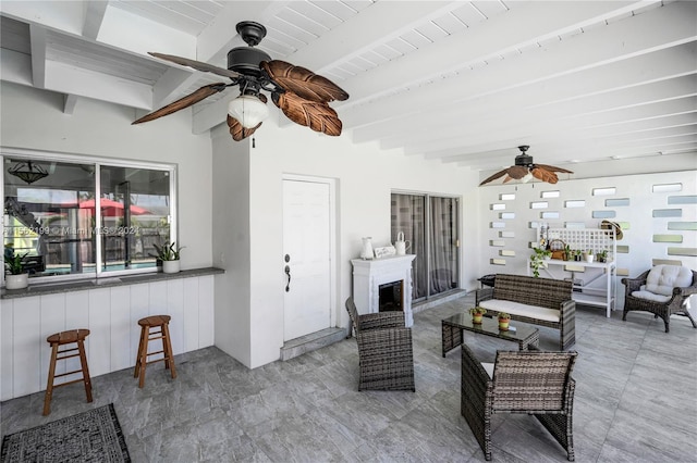 view of patio featuring an outdoor living space and ceiling fan