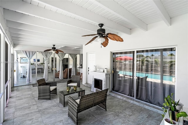 view of terrace featuring ceiling fan and outdoor lounge area