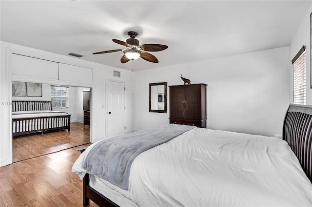 bedroom featuring ceiling fan and light wood-type flooring