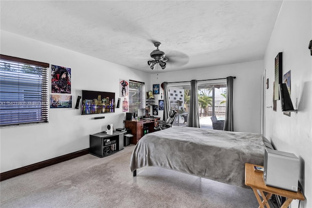 bedroom featuring a textured ceiling and ceiling fan