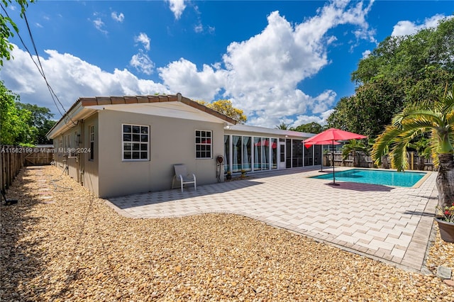 view of swimming pool featuring a patio