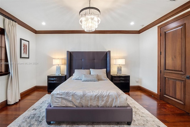 bedroom featuring a chandelier, crown molding, and dark wood-type flooring