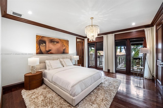 bedroom featuring access to exterior, a notable chandelier, dark hardwood / wood-style floors, and crown molding