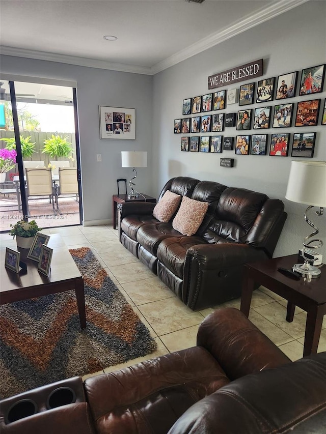 living room with crown molding and light tile flooring