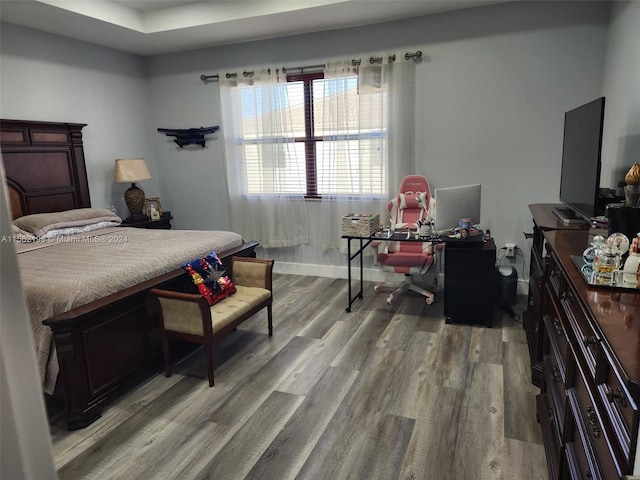 bedroom with light hardwood / wood-style floors