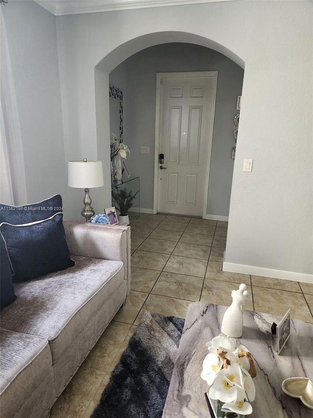 tiled living room with ornamental molding