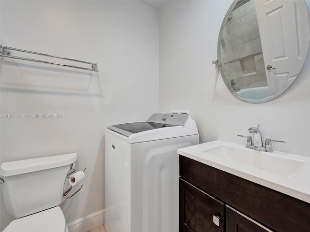 clothes washing area featuring sink