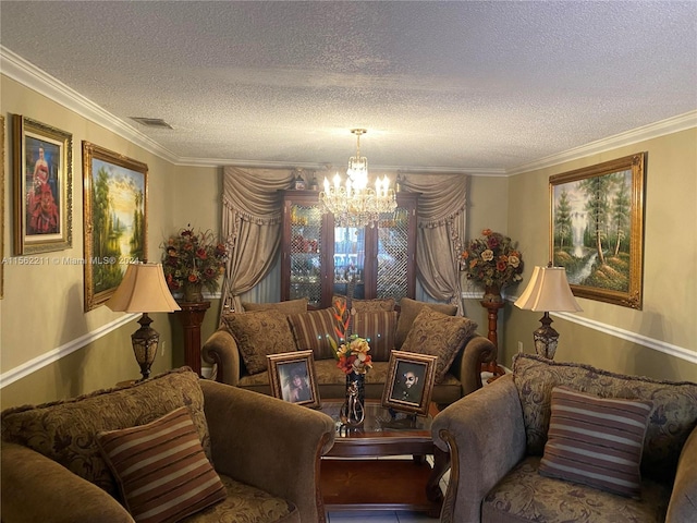 living room with a textured ceiling, a chandelier, and ornamental molding