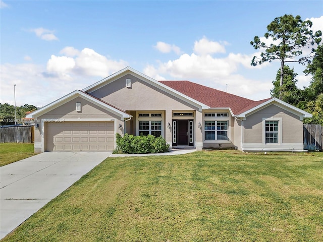 ranch-style house featuring a front lawn and a garage