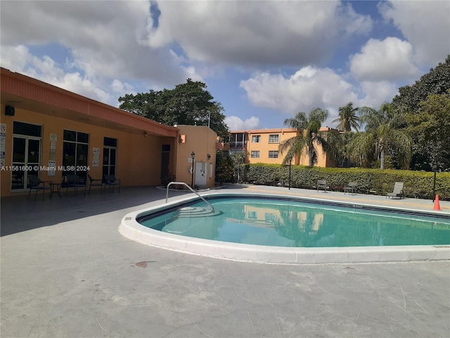 view of pool with a patio