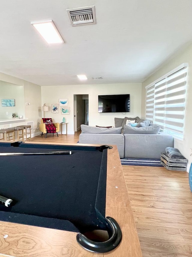 playroom with light wood-type flooring