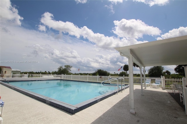 view of pool with a patio