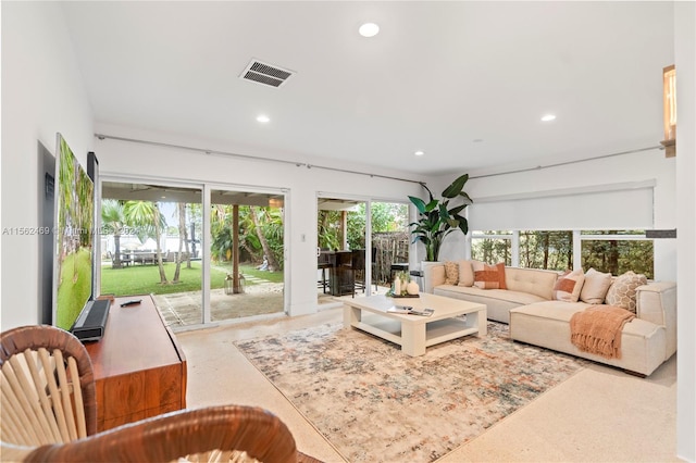 living room featuring plenty of natural light