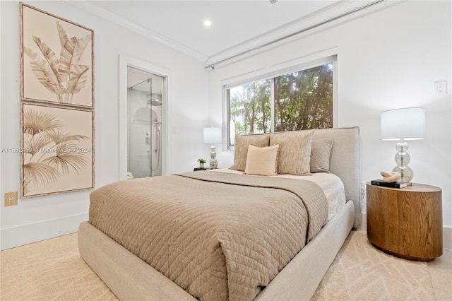 carpeted bedroom with a walk in closet, crown molding, connected bathroom, and a closet