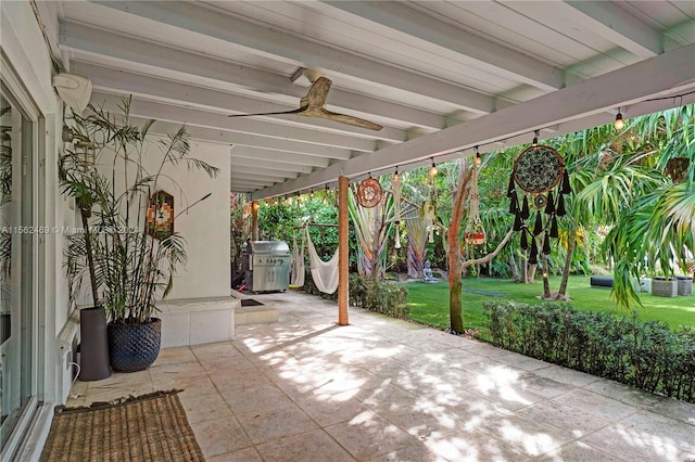 view of patio featuring ceiling fan and area for grilling