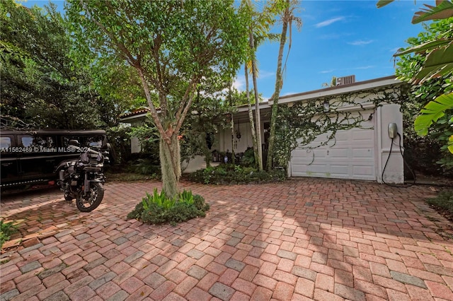 view of patio / terrace with a garage