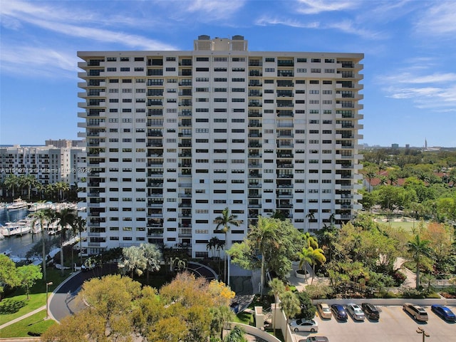 view of building exterior with a water view