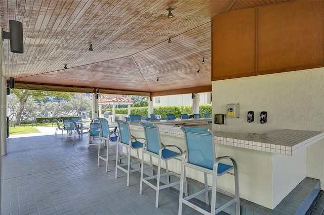 view of patio featuring a bar