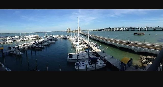 view of dock with a water view