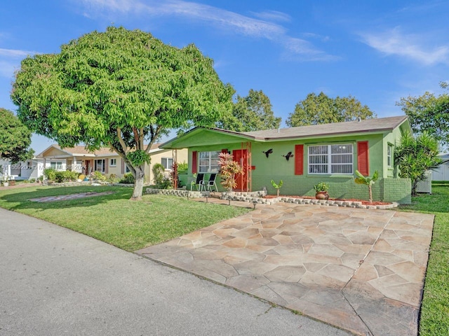 ranch-style house with a front lawn