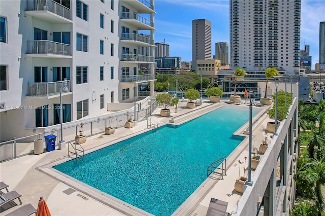 view of pool featuring a patio