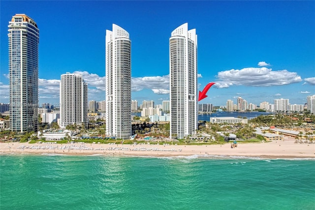 drone / aerial view with a view of the beach and a water view