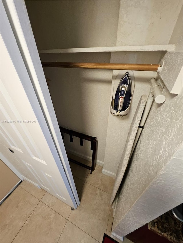 interior space featuring tile patterned flooring