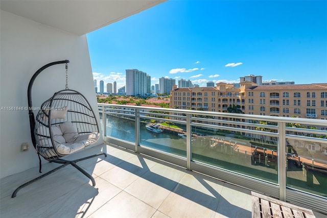 balcony featuring a water view