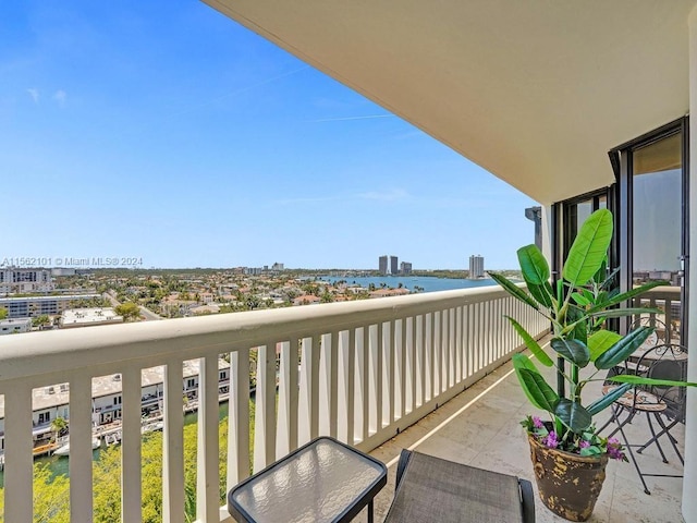 balcony featuring a water view